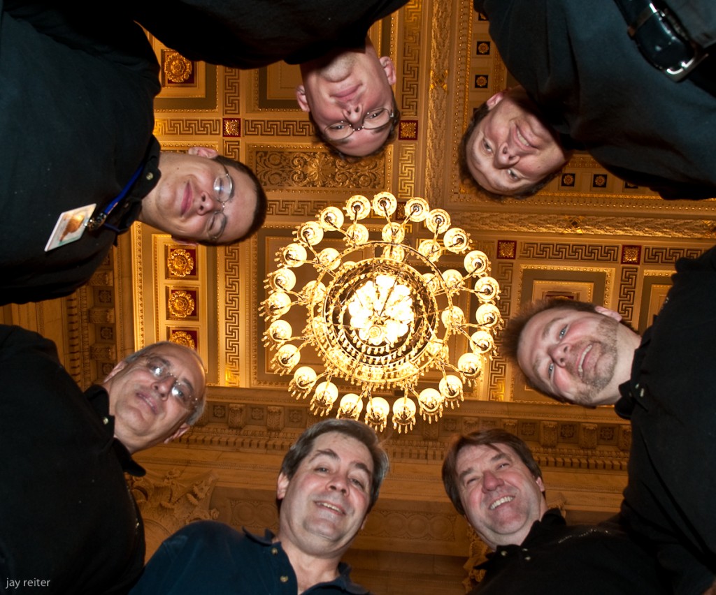 The Acu-Bright team poses for a team photo after the last chandelier is installed.